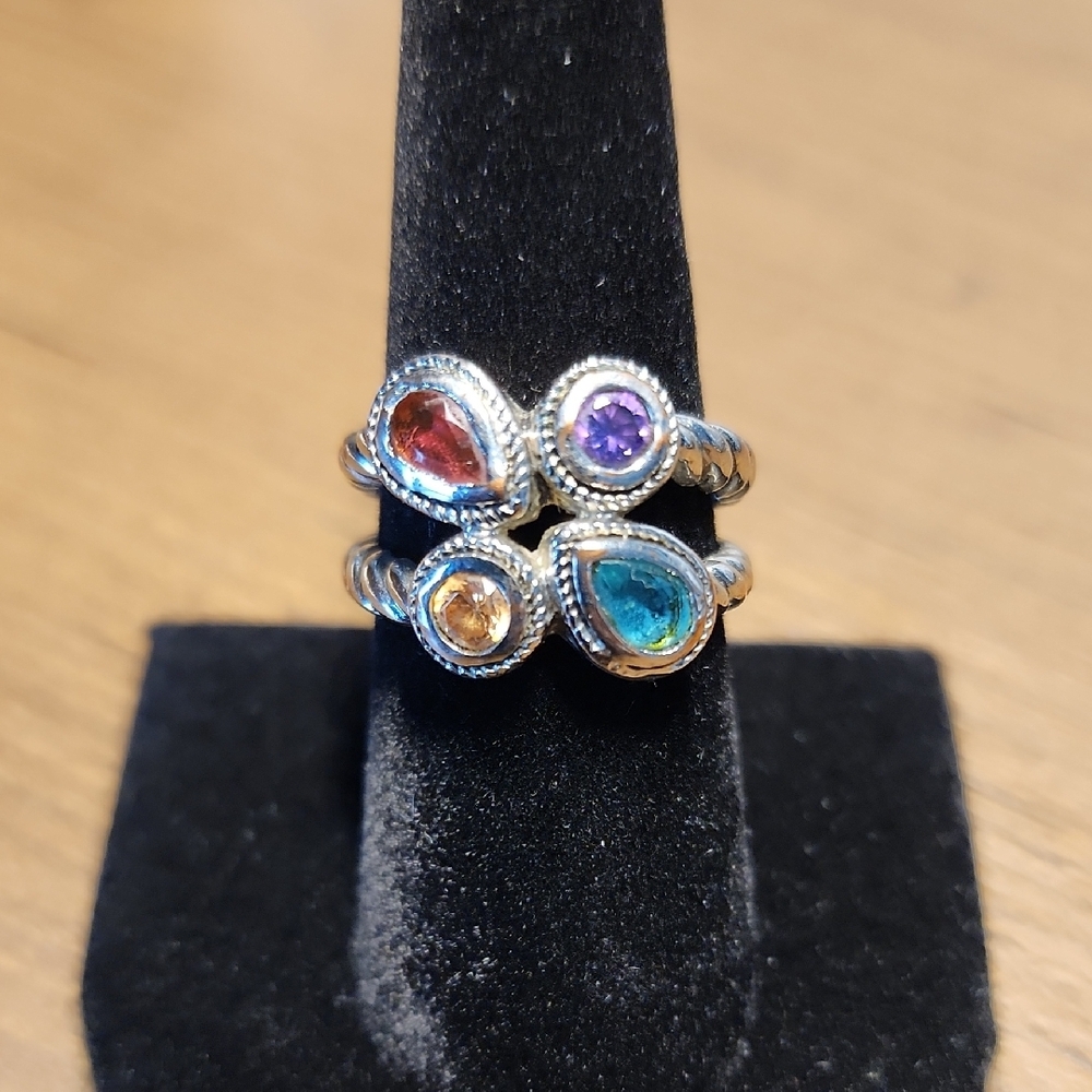 Red and Purple Gemstone Ring with Artistic Silver Design